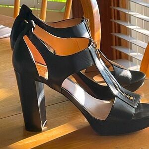 Block heel sandals. Black w/gold colored zipper closure. Excellent condit. Sz 9.